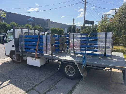 Tulla truck loaded with finished steel racks for delivery